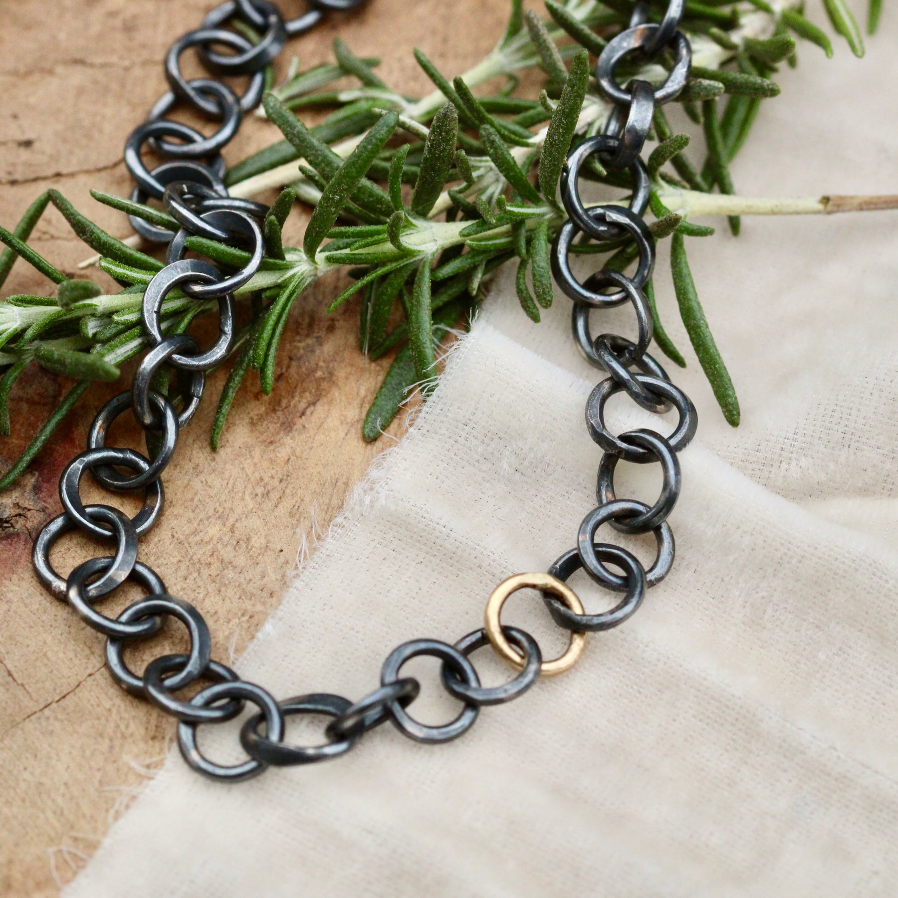 Heavy hand forged sterling silver and 18k yellow gold