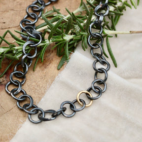 Heavy hand forged sterling silver and 18k yellow gold
