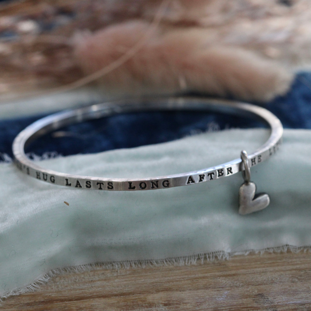 A Mother's Hug sterling silver bangle bracelet