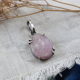 Rose cut Pink Sapphire prong set in sterling silver with heart detail