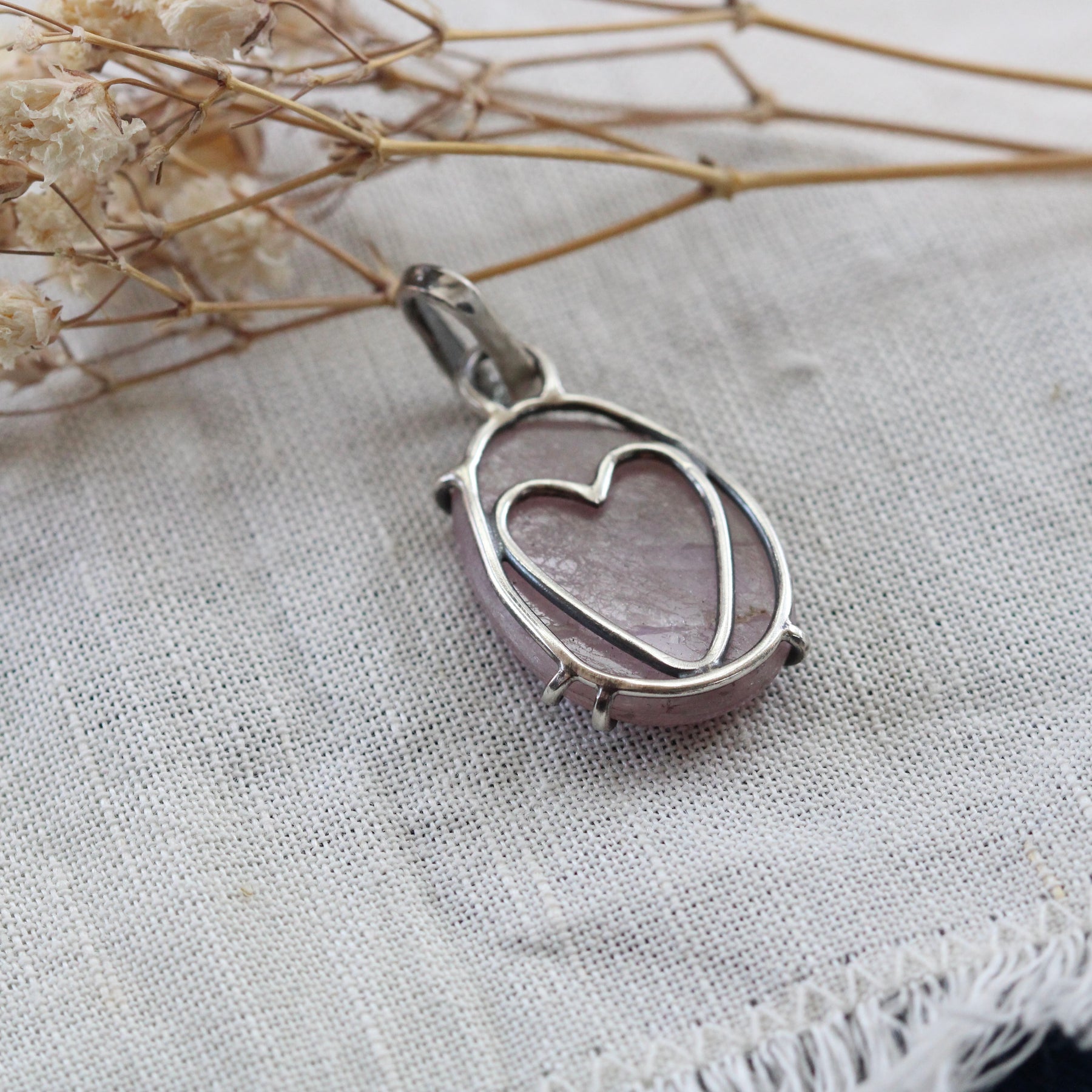 Rose cut Pink Sapphire prong set in sterling silver with heart detail