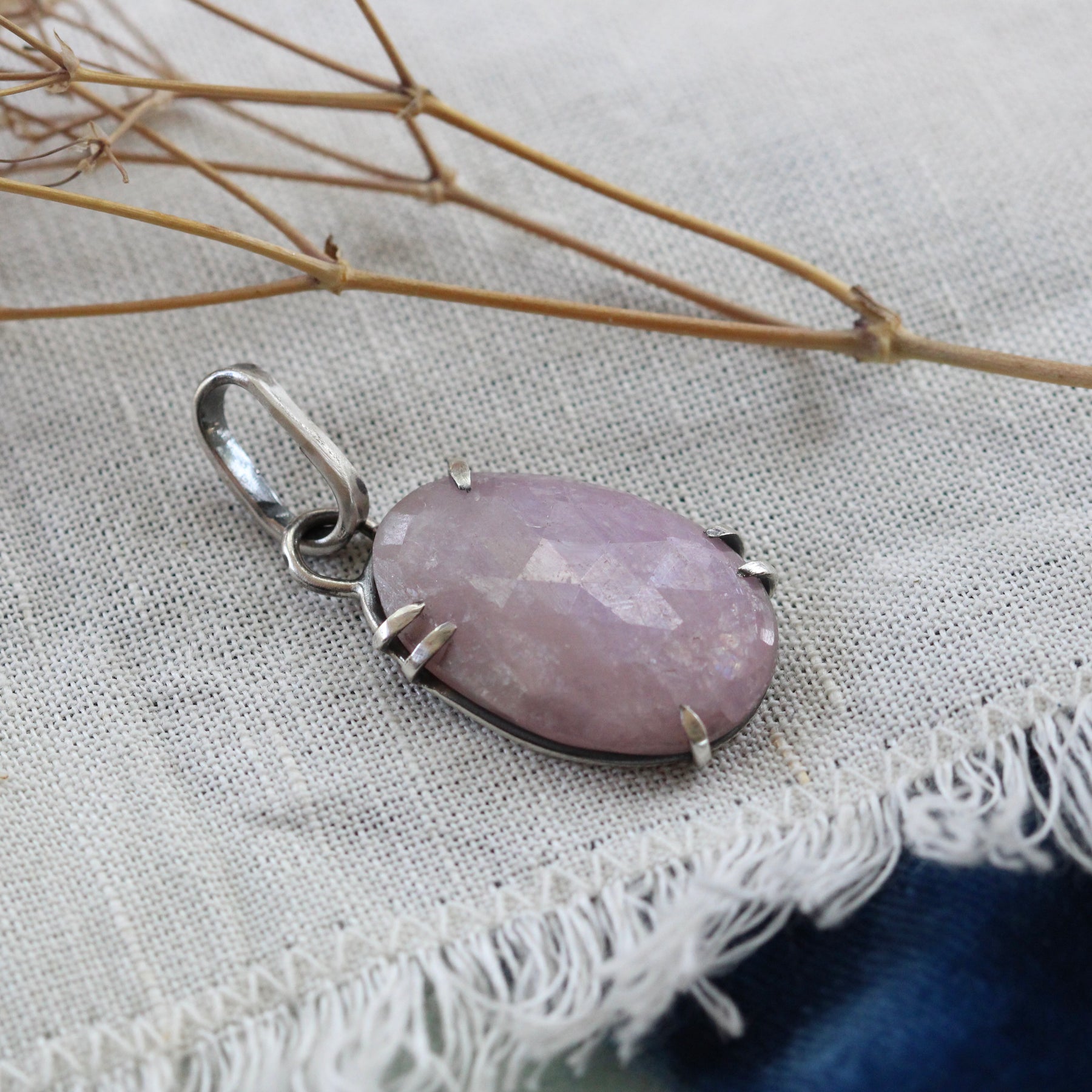 Rose cut Pink Sapphire prong set in sterling silver with heart detail