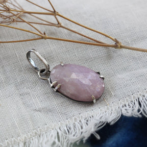 Rose cut Pink Sapphire prong set in sterling silver with heart detail