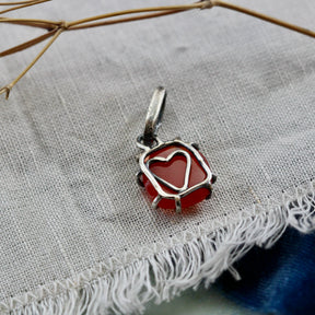 Rose cut Carnelian prong set in sterling silver with heart detail