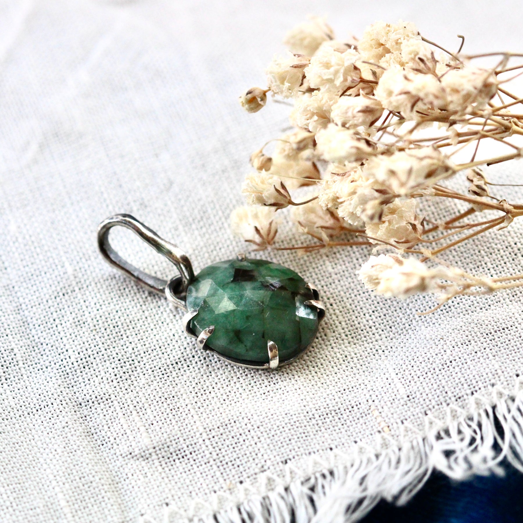 Rose cut Emerald prong set in sterling silver with heart detail