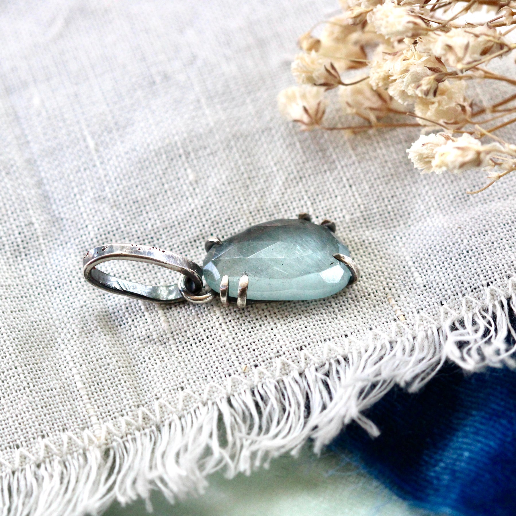 Rose cut Aquamarine prong set in sterling silver with heart detail