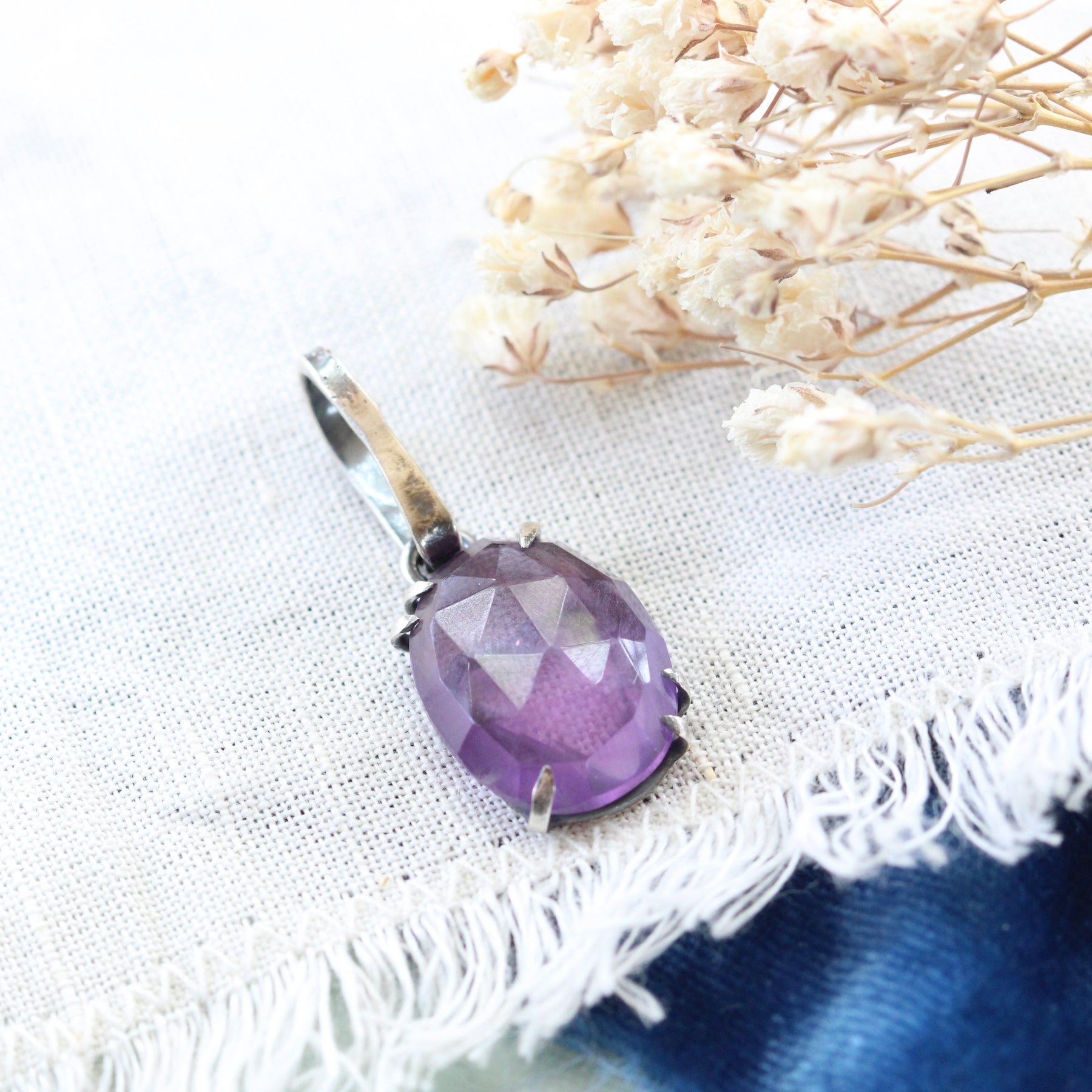 Rose cut Amethyst prong set in sterling silver with heart detail