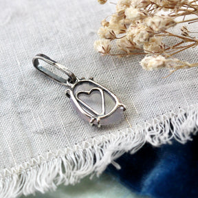 Rose cut Lavender Quartz prong set in sterling silver with heart detail