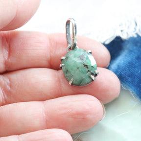 Rose cut Emerald prong set in sterling silver with heart detail