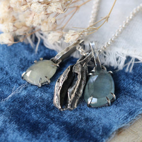 Rose cut Aquamarine prong set in sterling silver with heart detail