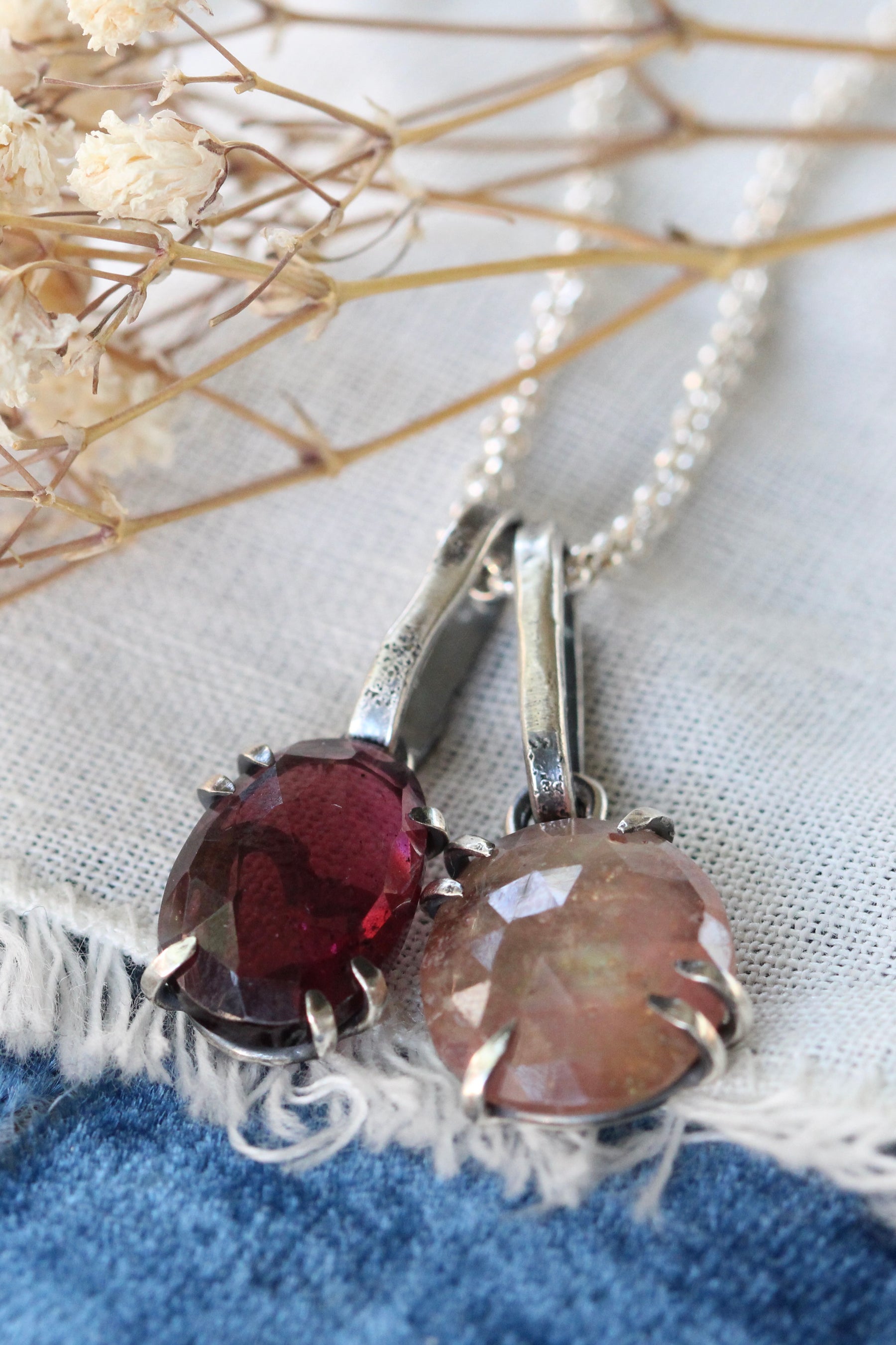 Rose cut Rhodolite Garnet prong set in sterling silver with heart deatail