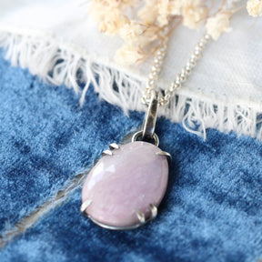 Rose cut Pink Sapphire prong set in sterling silver with heart detail