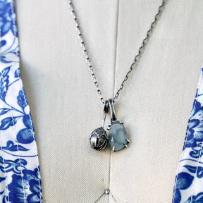 Rose cut Aquamarine prong set in sterling silver with heart detail
