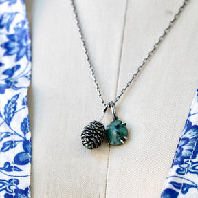 Rose cut Emerald prong set in sterling silver with heart detail