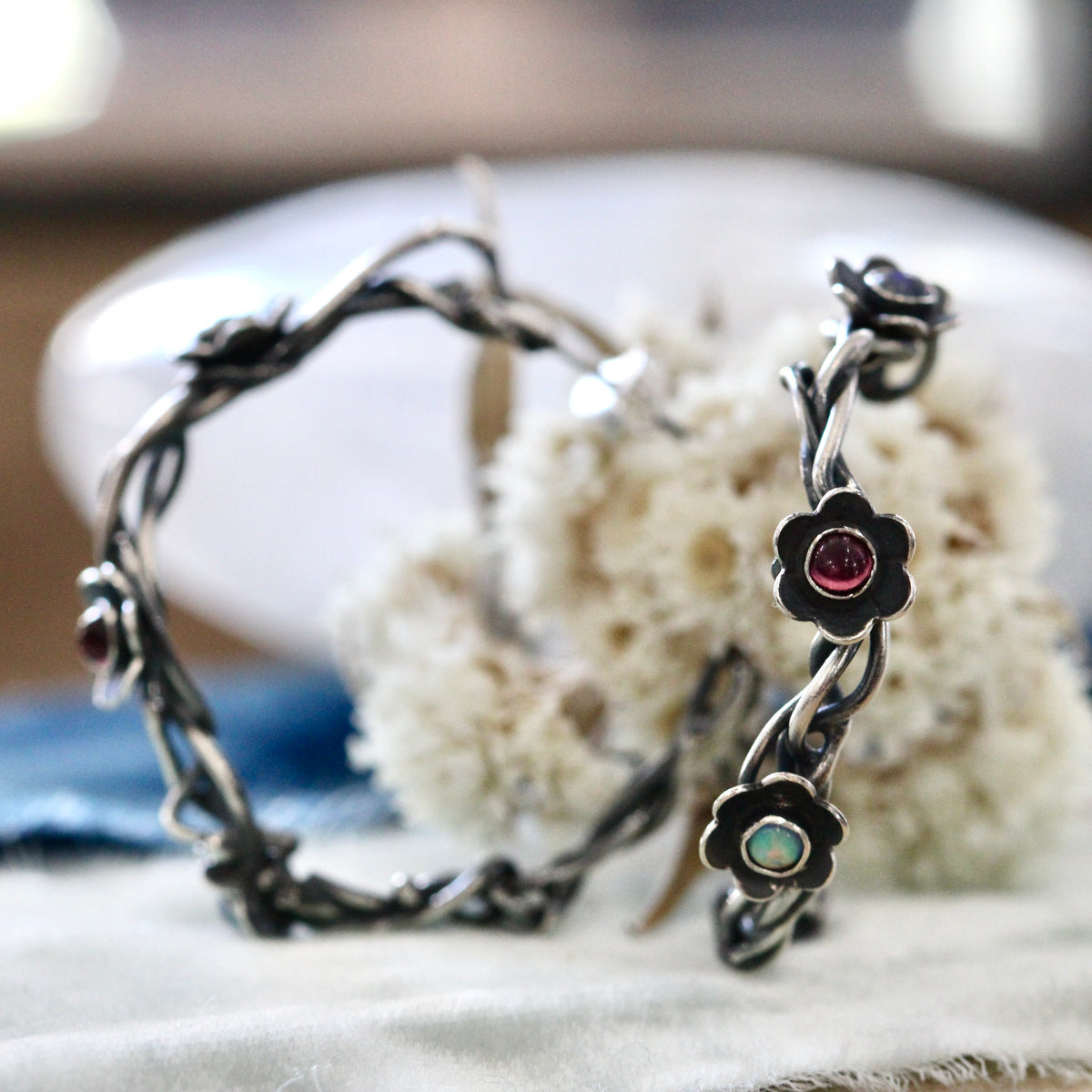 Kindred Woven Sterling Silver Hoop Earrings with Flowers and Gemstones