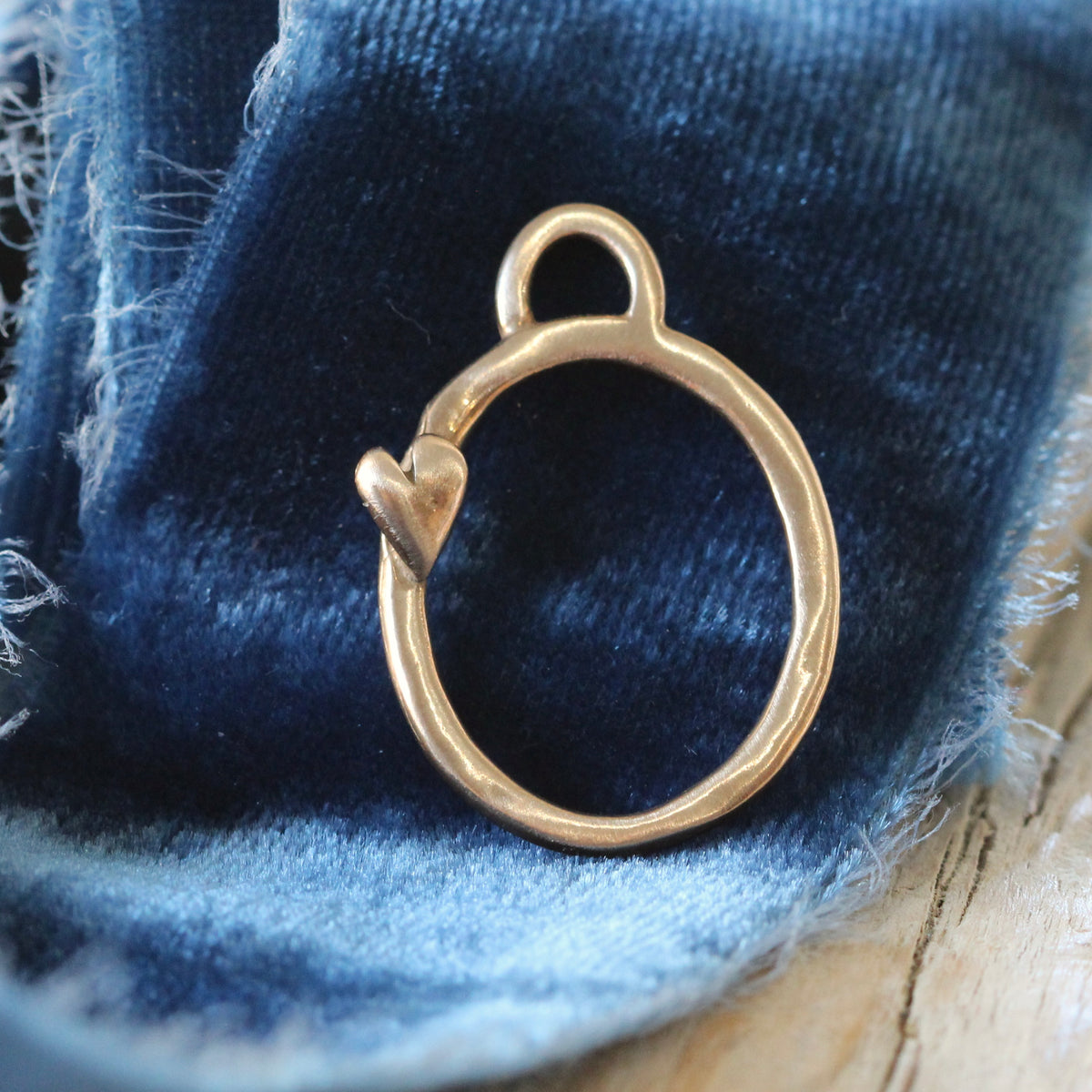 Open Oval with heart in Bronze. ARCHIVE SALE